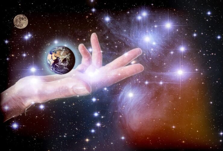 Hand hält einen Planeten in einer Weltraumgrafik